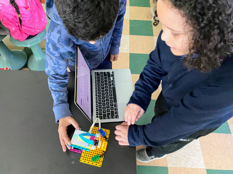 Student on a field trip conducting a fresh water study in upstate NY.